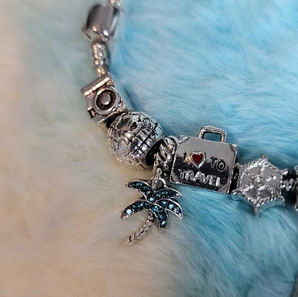 Silver tone charm bracelet, travel beach theme 7 to 8 in - Picture 5 of 9